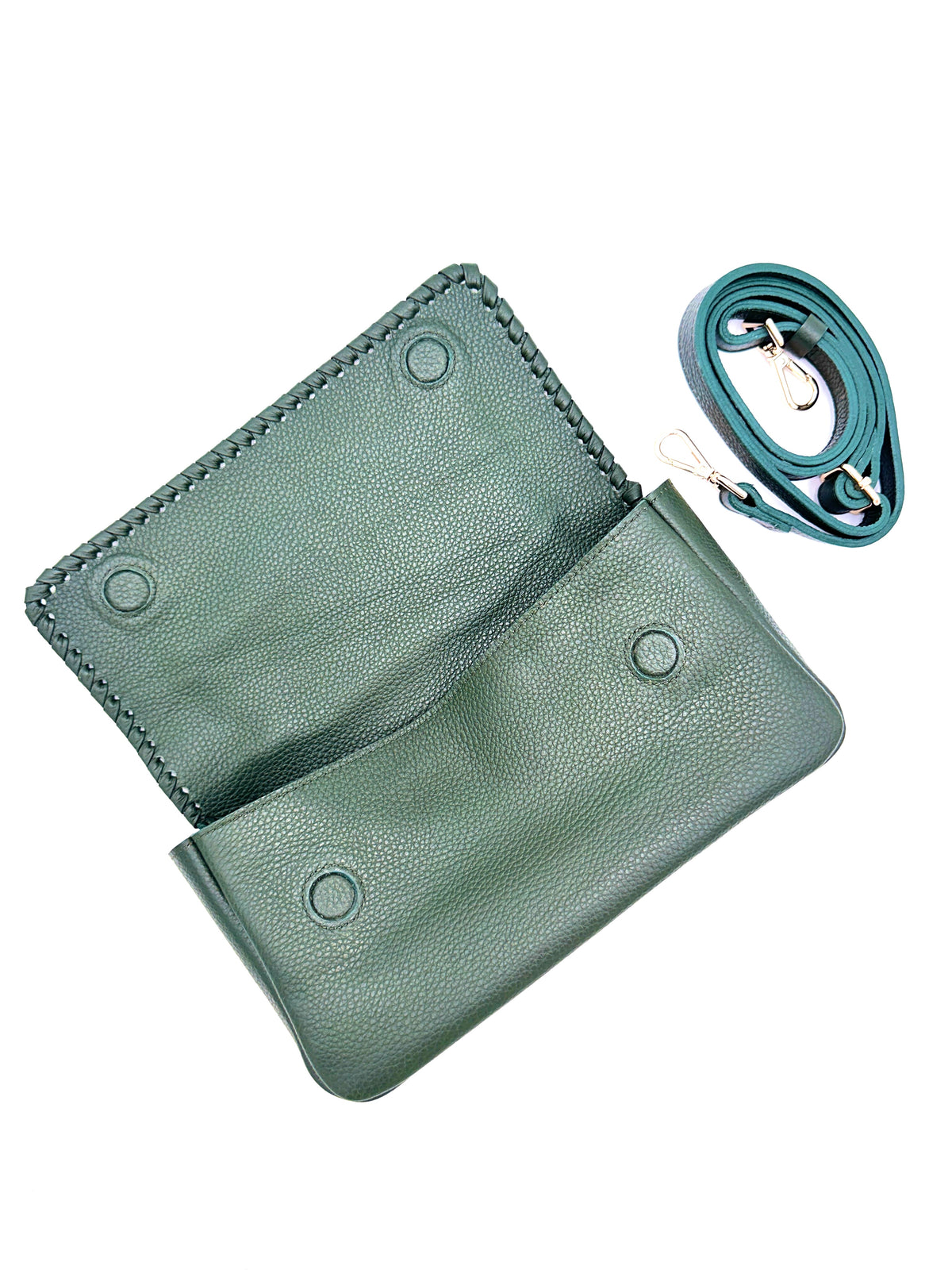Green leather pouch with a strap rolled up beside it on a white background