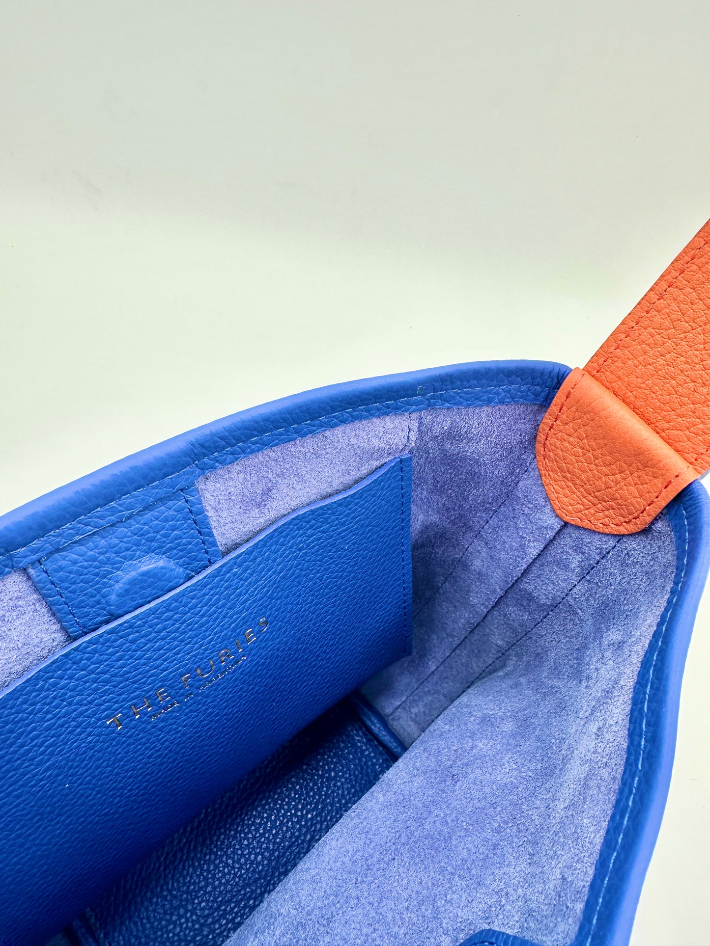 Grace Bucket Bag - Sapphire with Bright Orange Underhandle