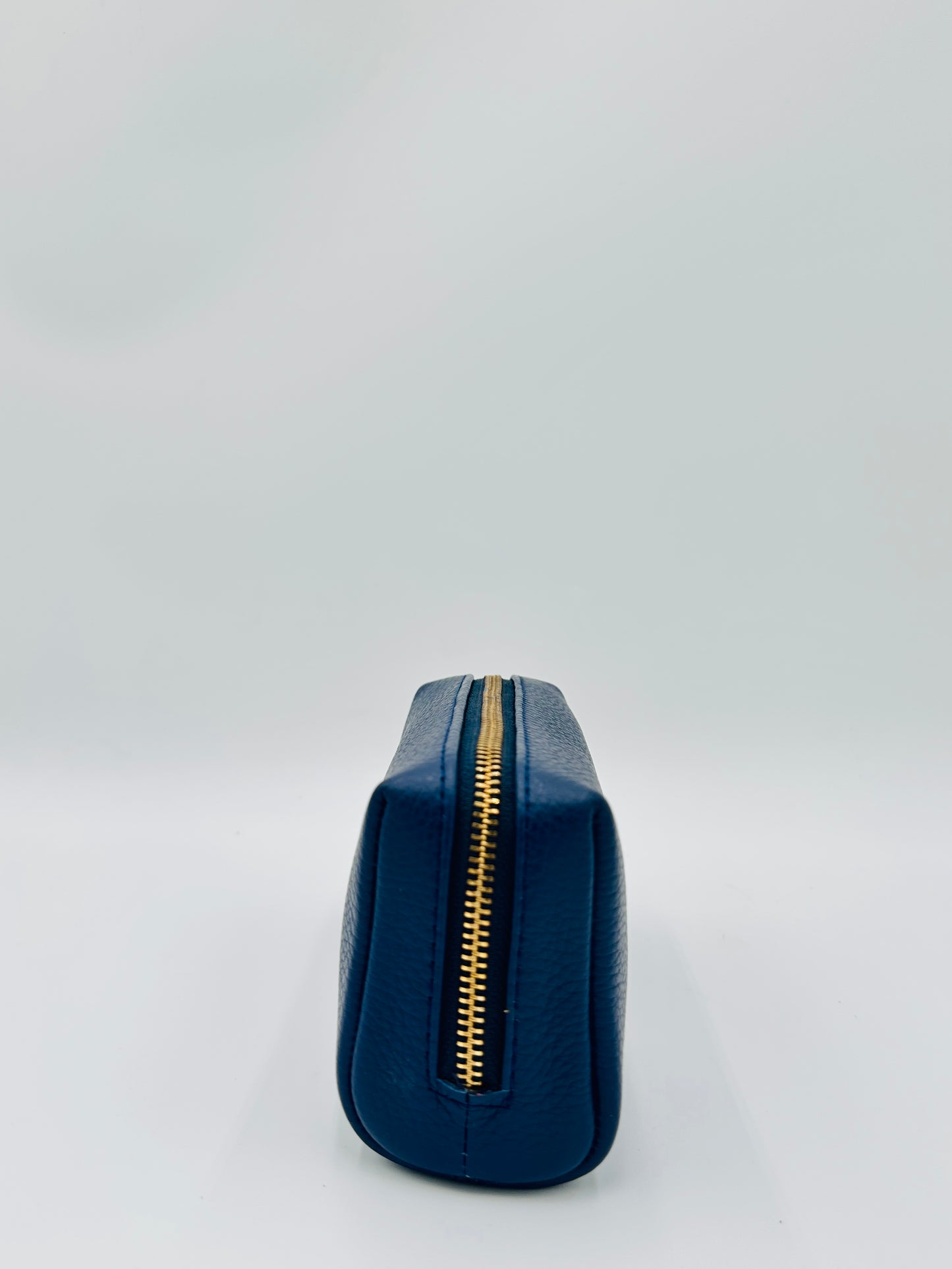 Small Makeup Bag in Navy with a Bright Red Interior