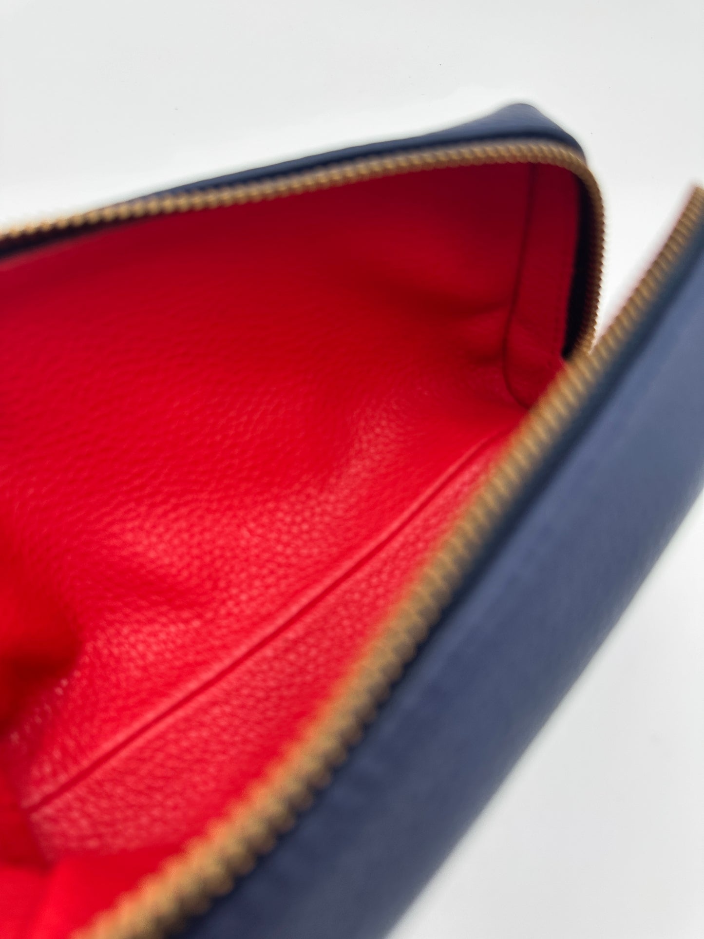 Small Makeup Bag in Navy with a Bright Red Interior
