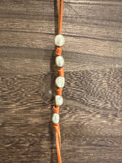 The Lady with a Pearl (Cognac) bag charm from The Furies Collective — beaded charm on leather lace for handbag styling.