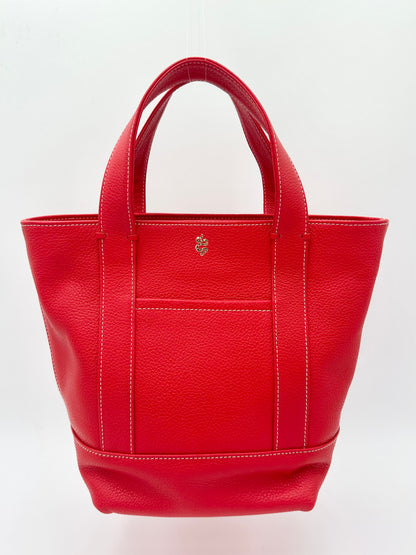 The Small Carolyn crossbody handbag from The Furies Collective in Lipstick Red — pebble leather with zip top and exterior pocket.