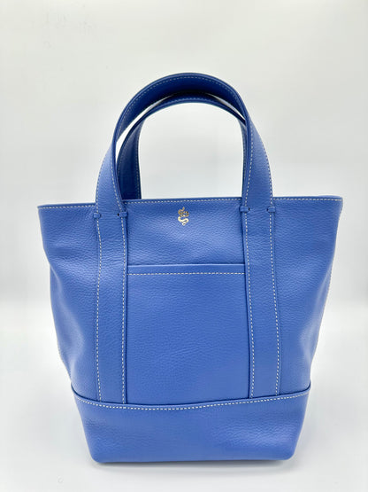 The Small Carolyn crossbody handbag from The Furies Collective in Sapphire — pebble leather with zip top and exterior pocket.