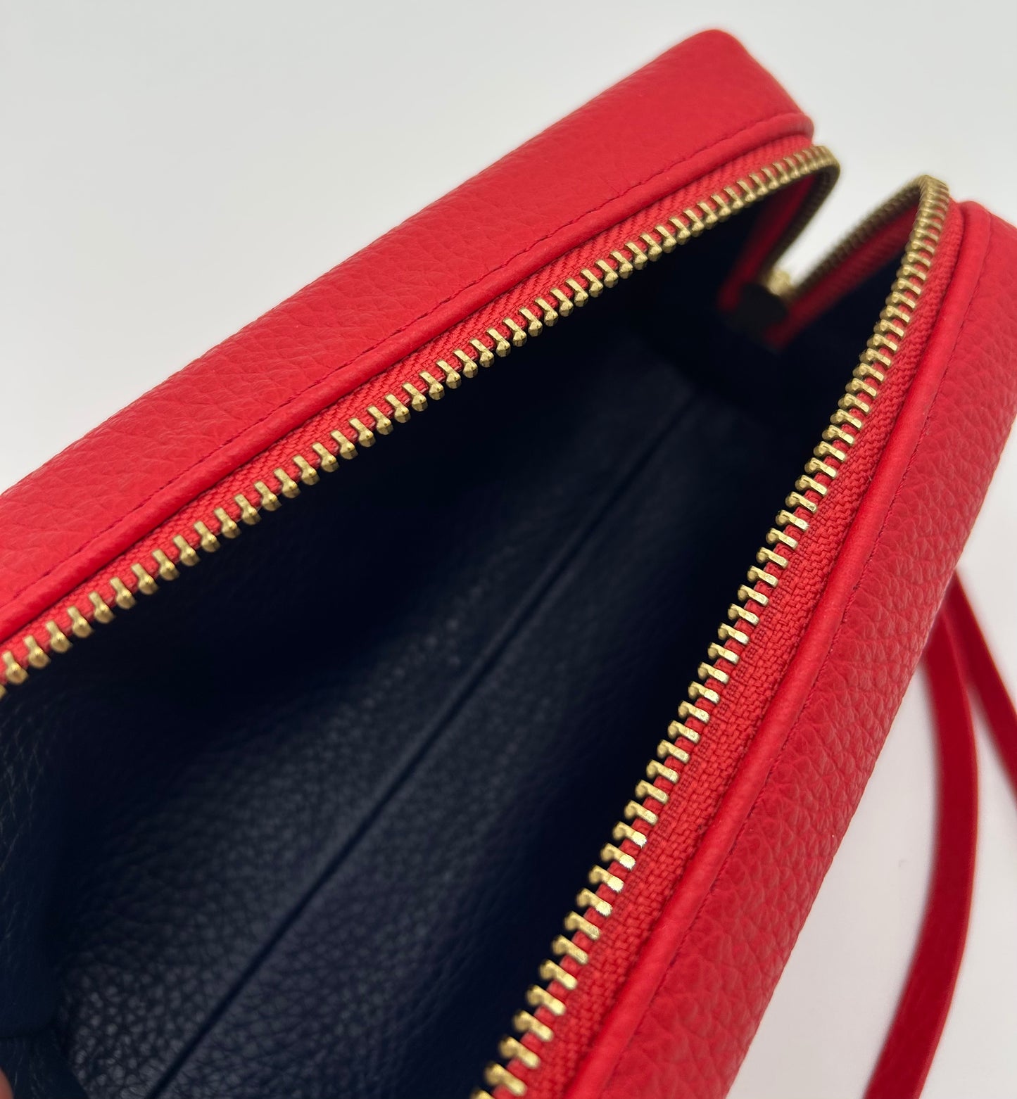 Small Makeup Bag in Lipstick Red with a Navy Interior