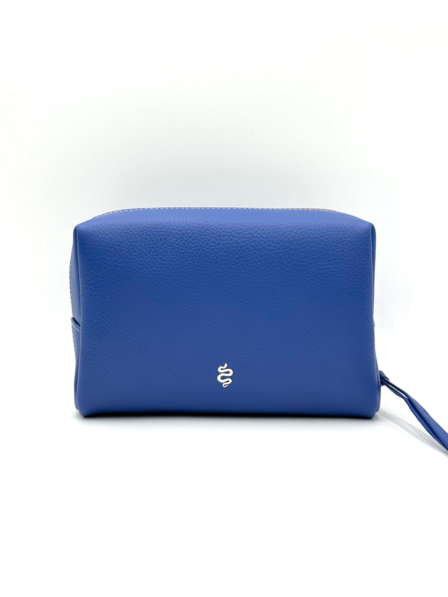The Large Accessories Bag from The Furies Collective in Sapphire with a Silver Interior — pebble leather travel pouch lined in contrast color.