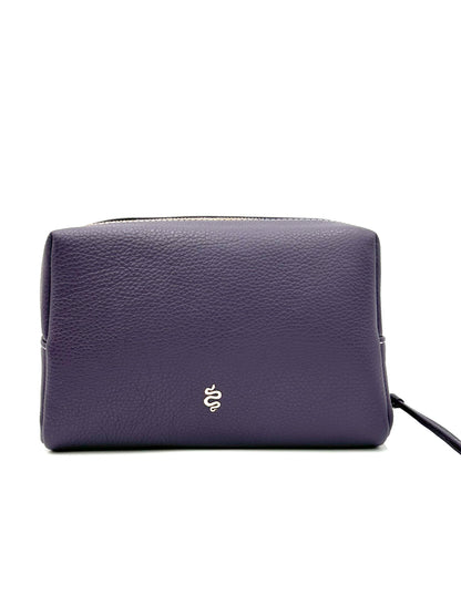 The Large Accessories Bag from The Furies Collective in Eggplant with a Lilac Interior — pebble leather travel pouch lined in contrast color.