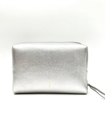 The Large Accessories Bag from The Furies Collective in Silver with a Sapphire Interior — pebble leather travel pouch lined in contrast color.