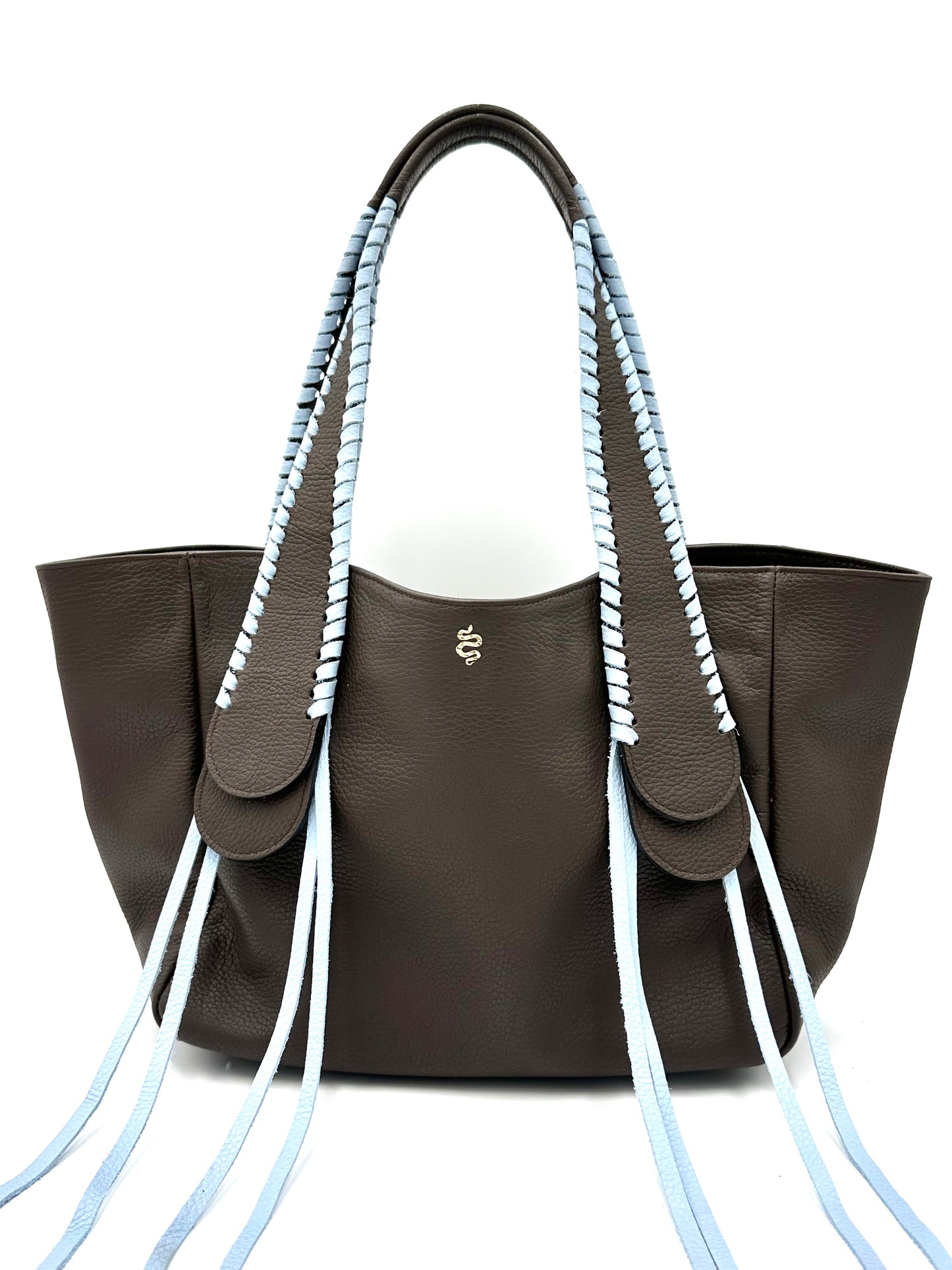 The Talitha tote handbag from The Furies Collective in Espresso with Sky Blue Lacing — pebble leather with whipstitched fringe handles and the Furies snake logo.