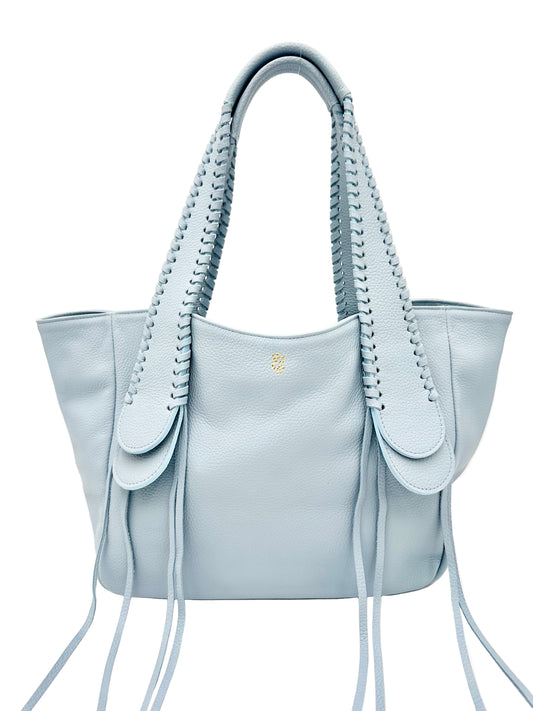 Light blue handbag with braided handles and fringe detail with a snake logo